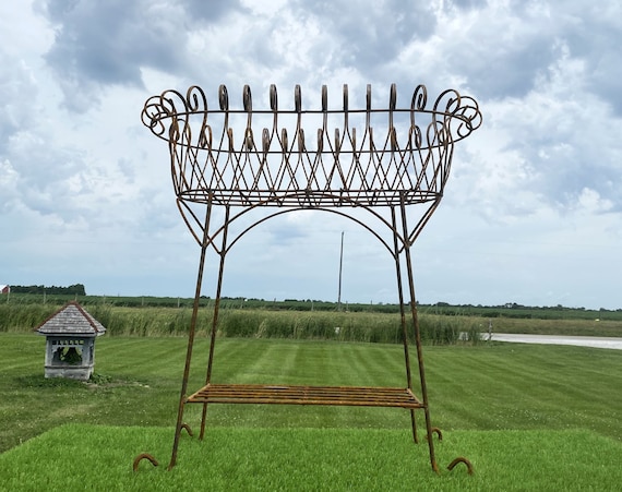 Charming Wrought Iron Planters and Plant Stands: Enhance Your Garden Aesthetics